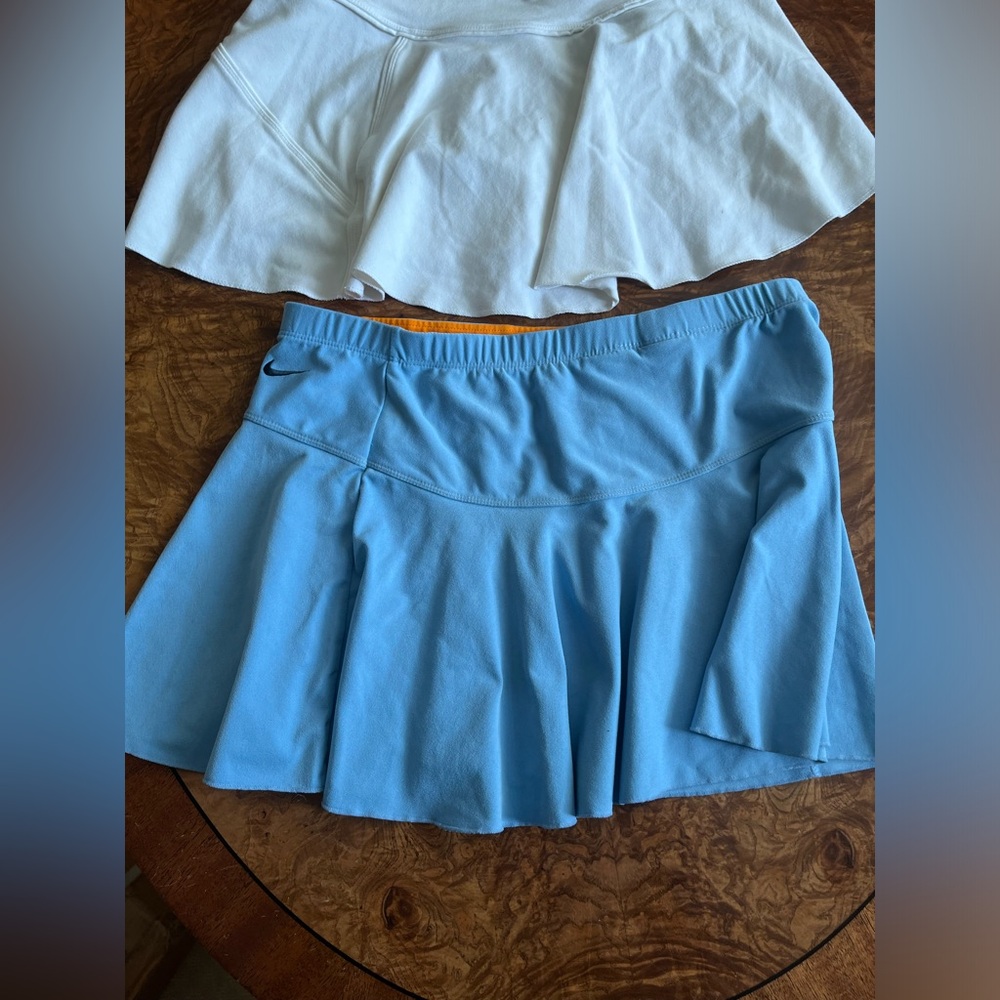 Lot of Two womans tennis shirts
